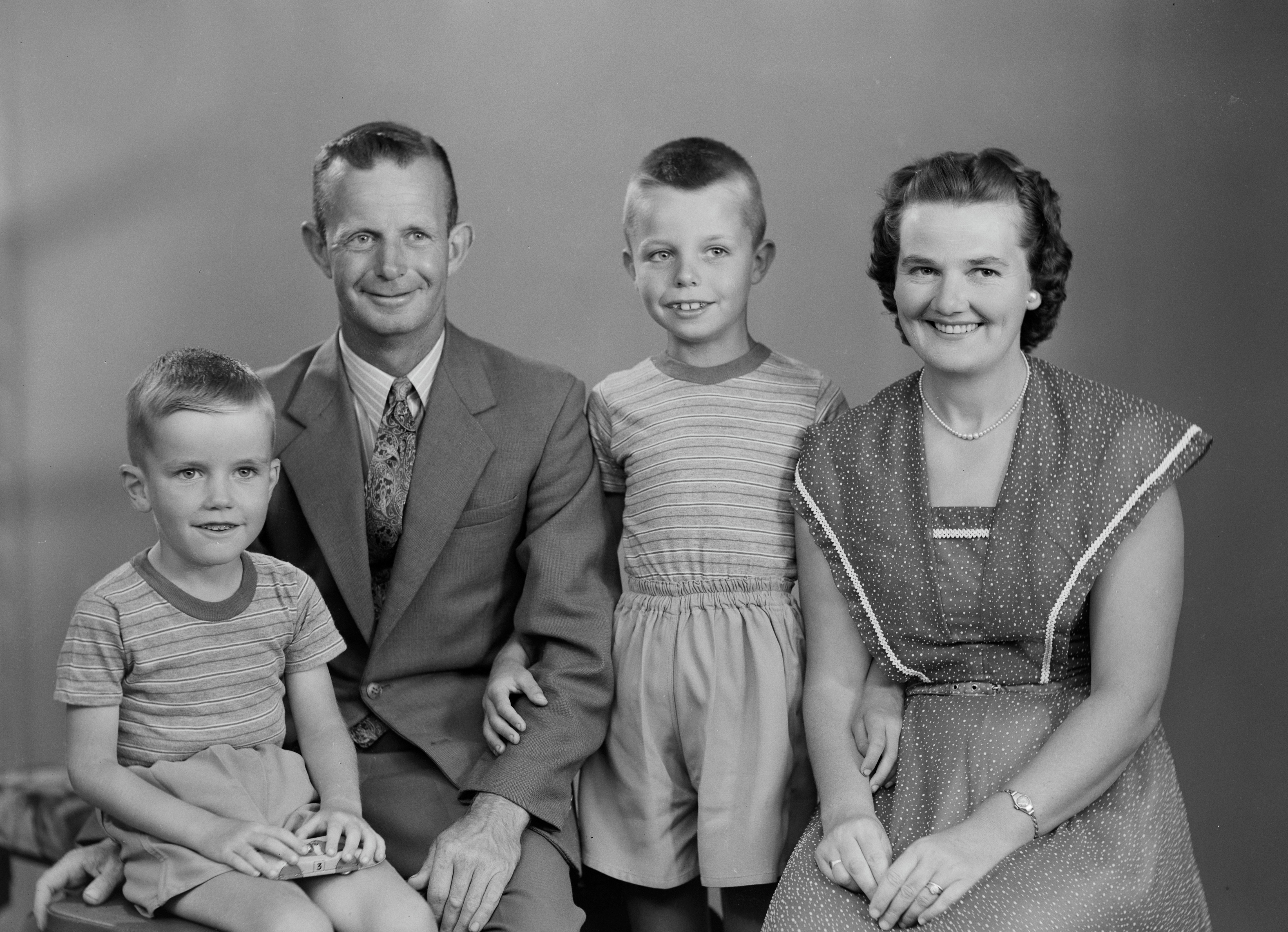 Clem and Nancy with their sons Wayne and Glenn (29 January 1957). Swainson's Studios. Collection of Puke Ariki (WD.003517).