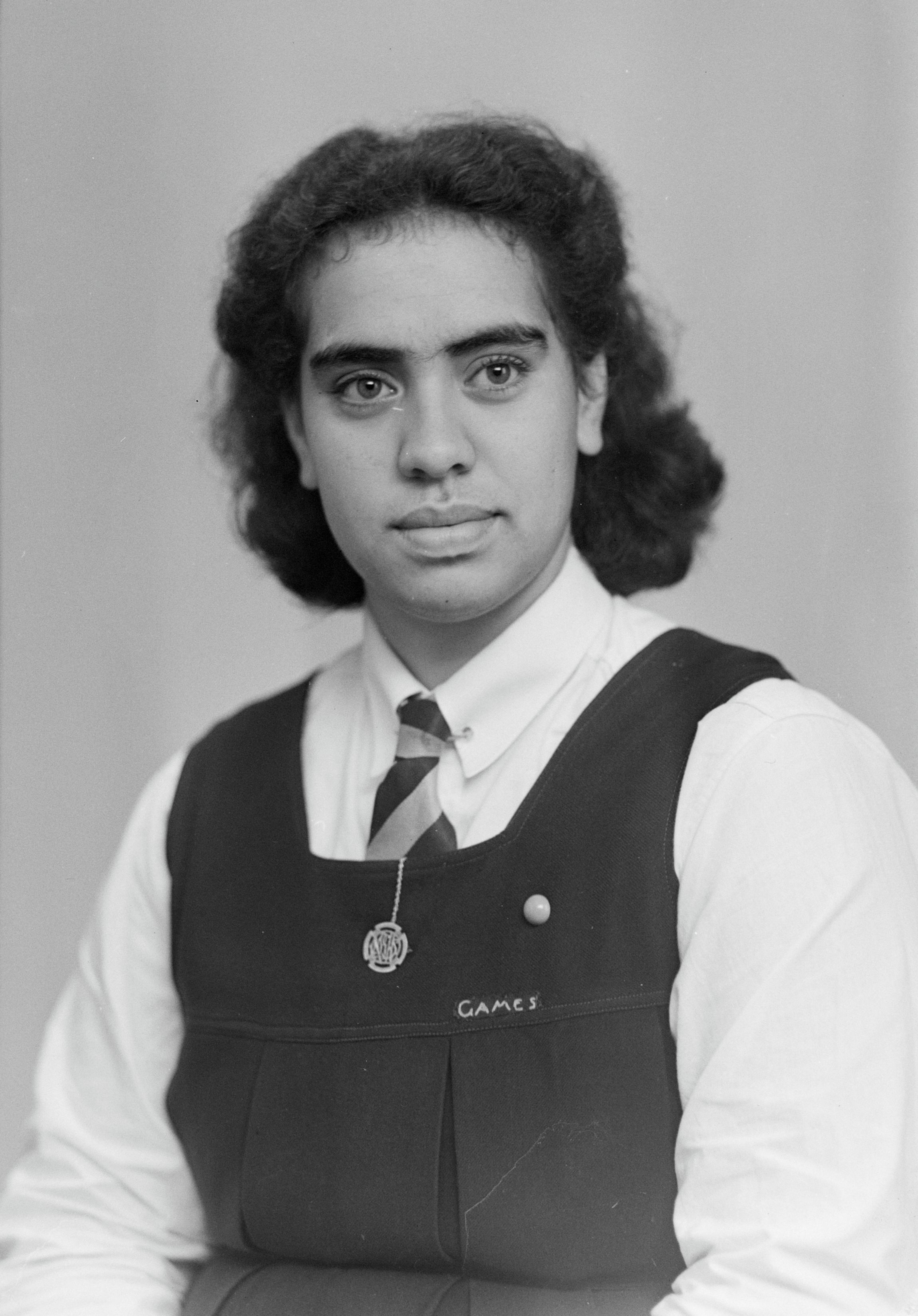 Marama Koea wearing her New Plymouth Girls' High School uniform (26 July 1946). Swainson's Studios. Collection of Puke Ariki (SW1946.0434).