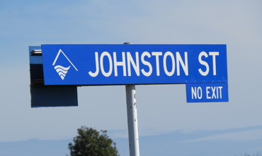 Johnston Street sign (2019). Rachel Sonius. Word on the Street image collection.