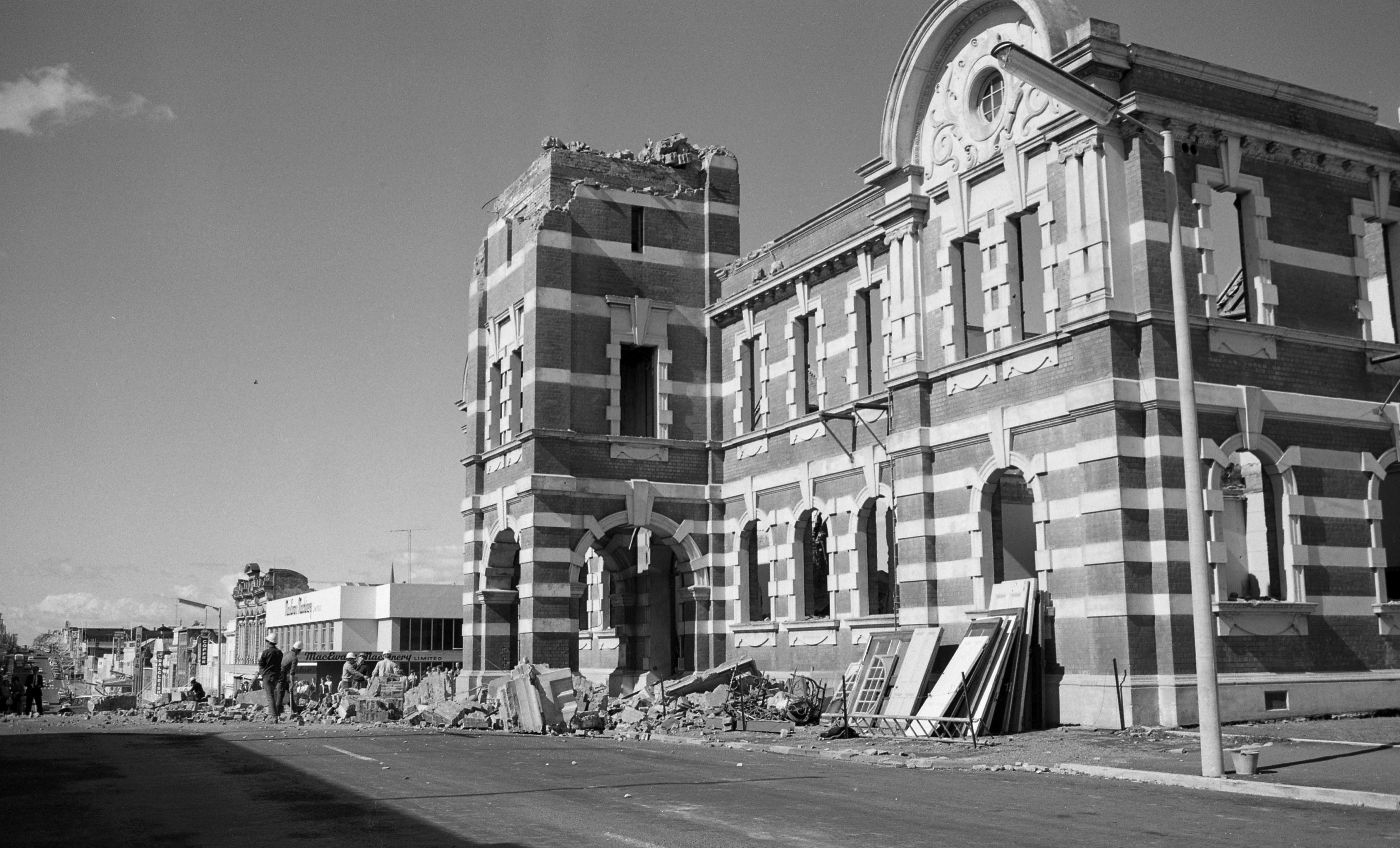 New Plymouth's old post office and clock tower during demolition (10 April 1969). Caleb Wyatt. Collection of Puke Ariki, New Plymouth (PHO2011-2089).